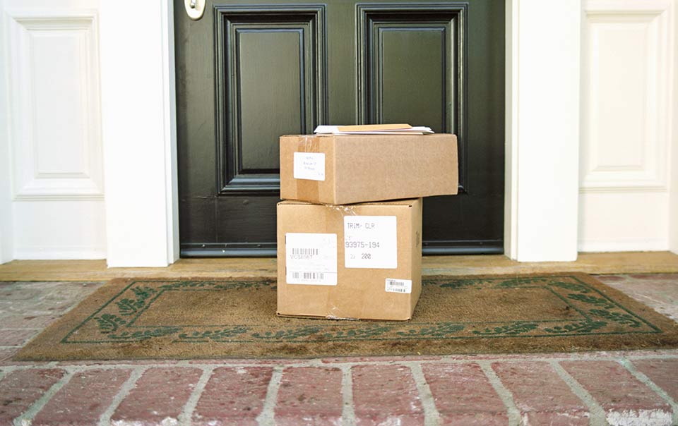 Packages on the front step of a house
