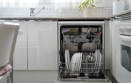 a dishwasher filled with dishes
