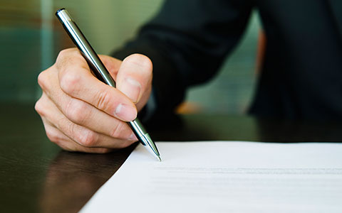 person signing a contractual risk transfer contract