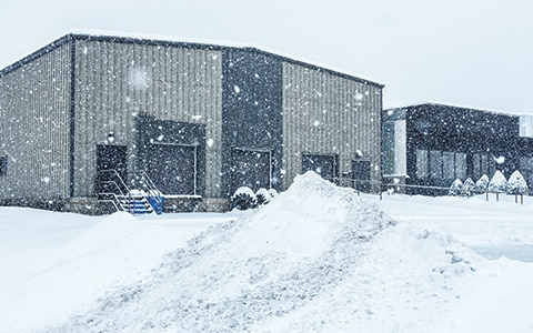 illustration of snow on a commercial building