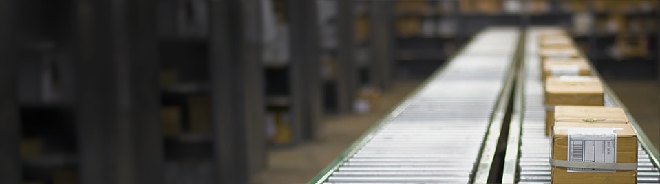 Boxes on a supply chain conveyor belt