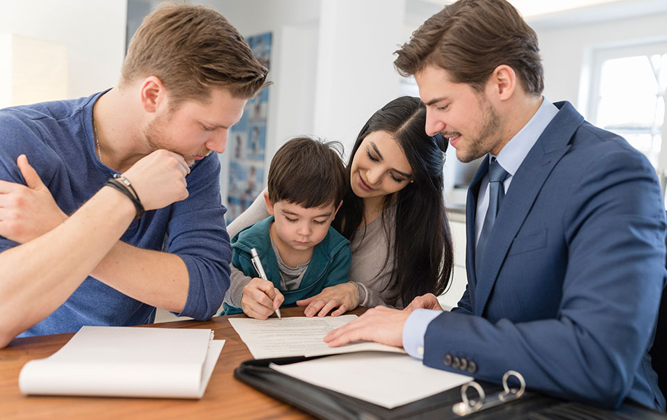 Family meeting with real estate agent to buy new home