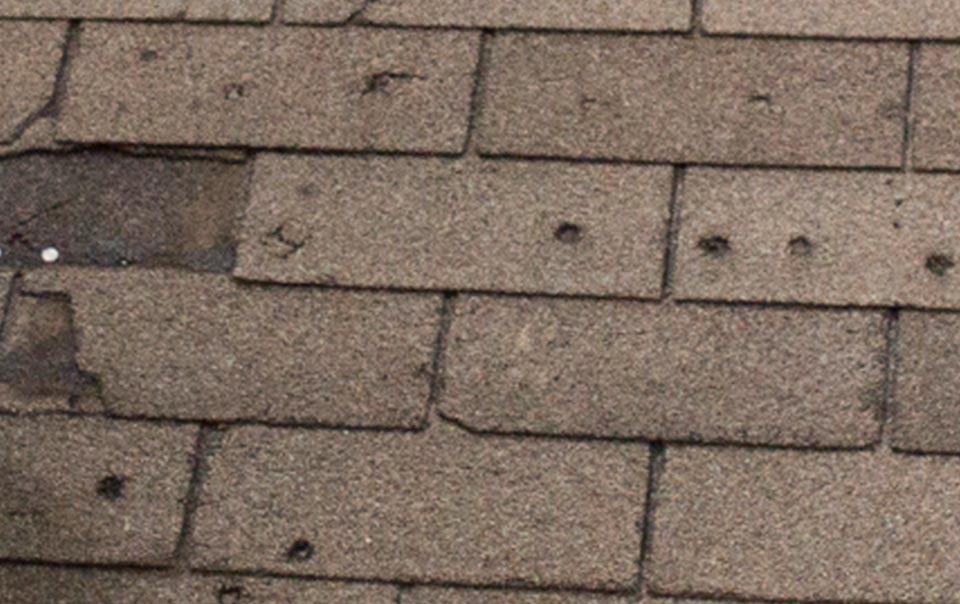 Close-up of roof hail damage