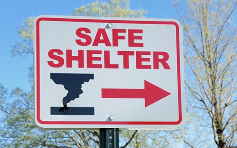 Seek shelter sign for what to do in a tornado
